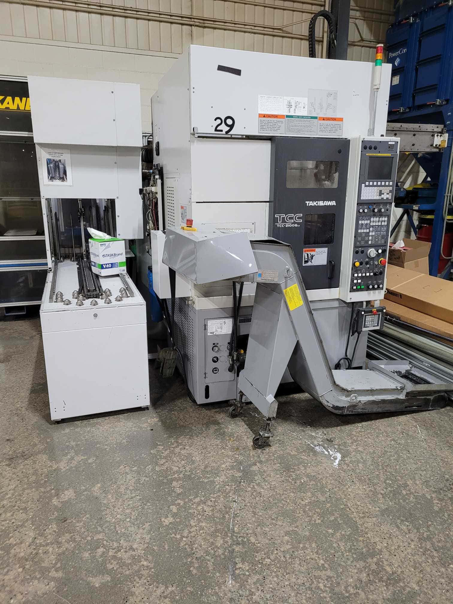 Takisawa TCC-2100G L2 CNC Lathe, 2017. Chip Conveyor, Carousel Feeder, Fanuc Control