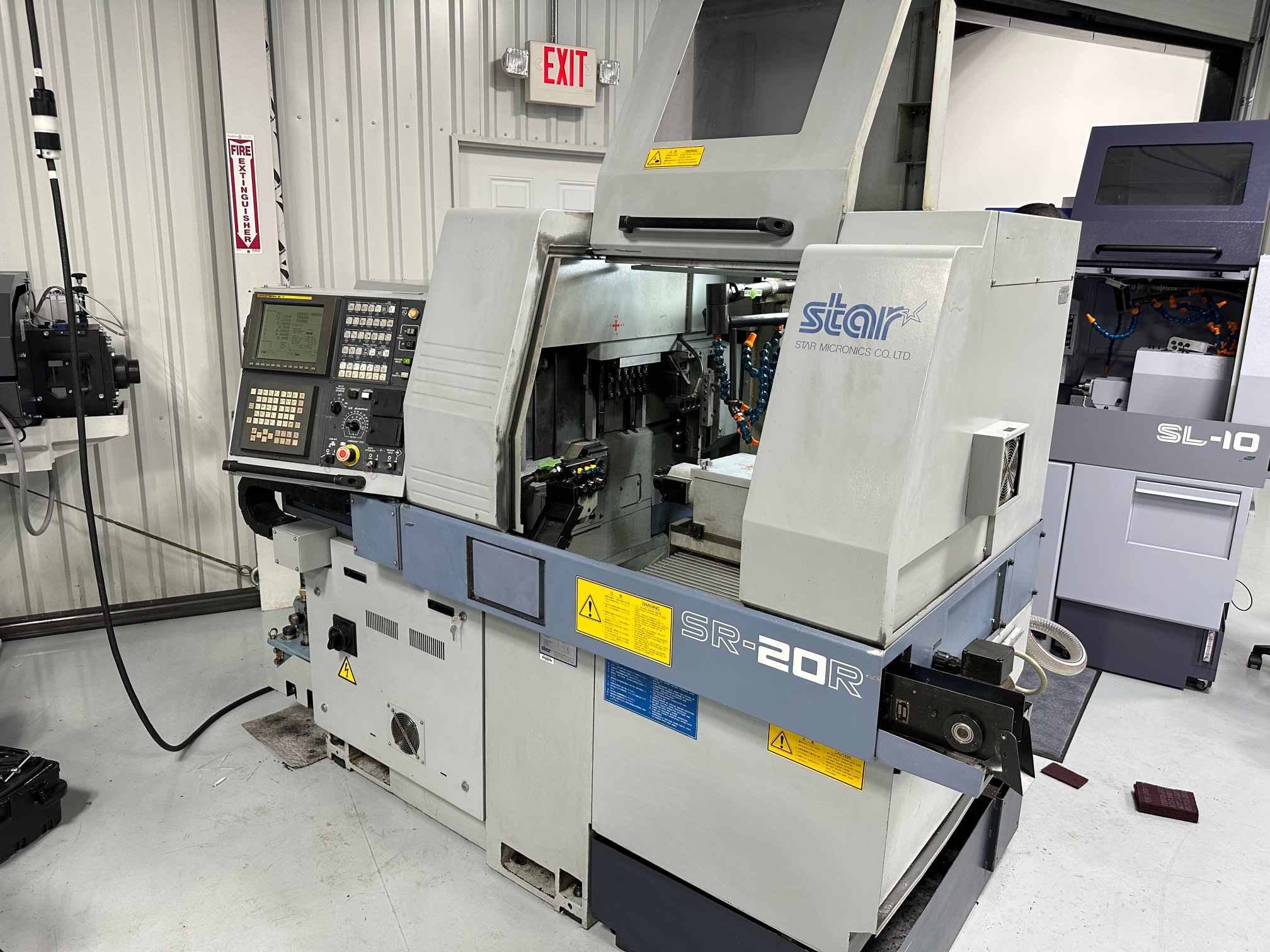 Star SR-20R Swiss CNC Lathe, 2000 - Bar Feeder