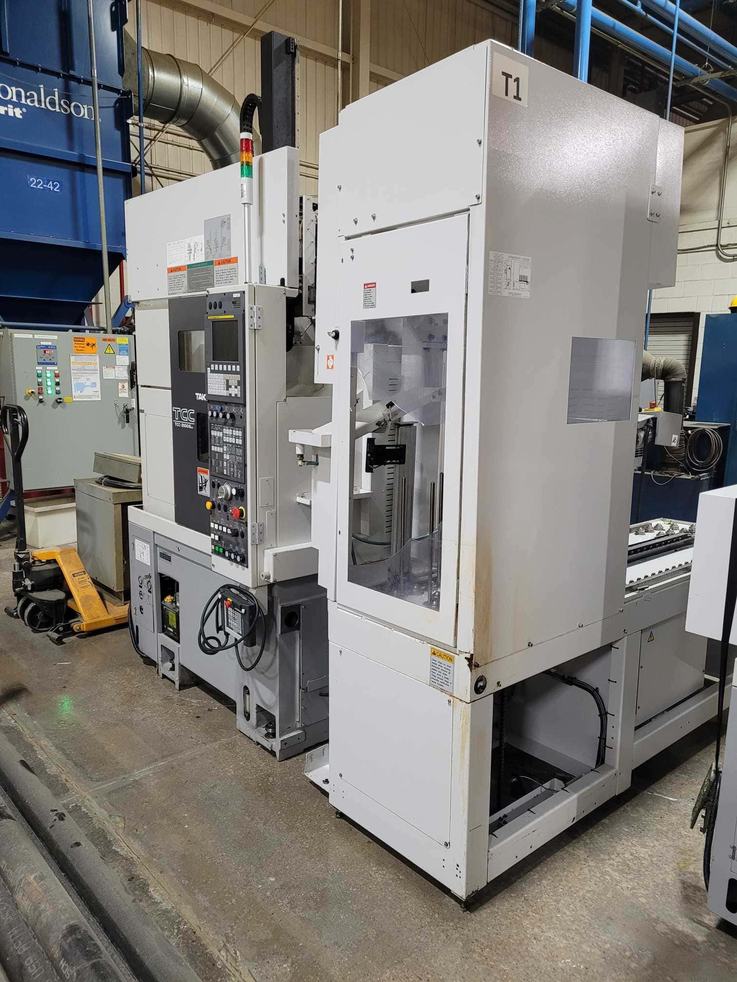 Takisawa TCC-2100G L2 CNC Lathe, 2017. Chip Conveyor, Carousel Feeder, Fanuc Control - Image 2