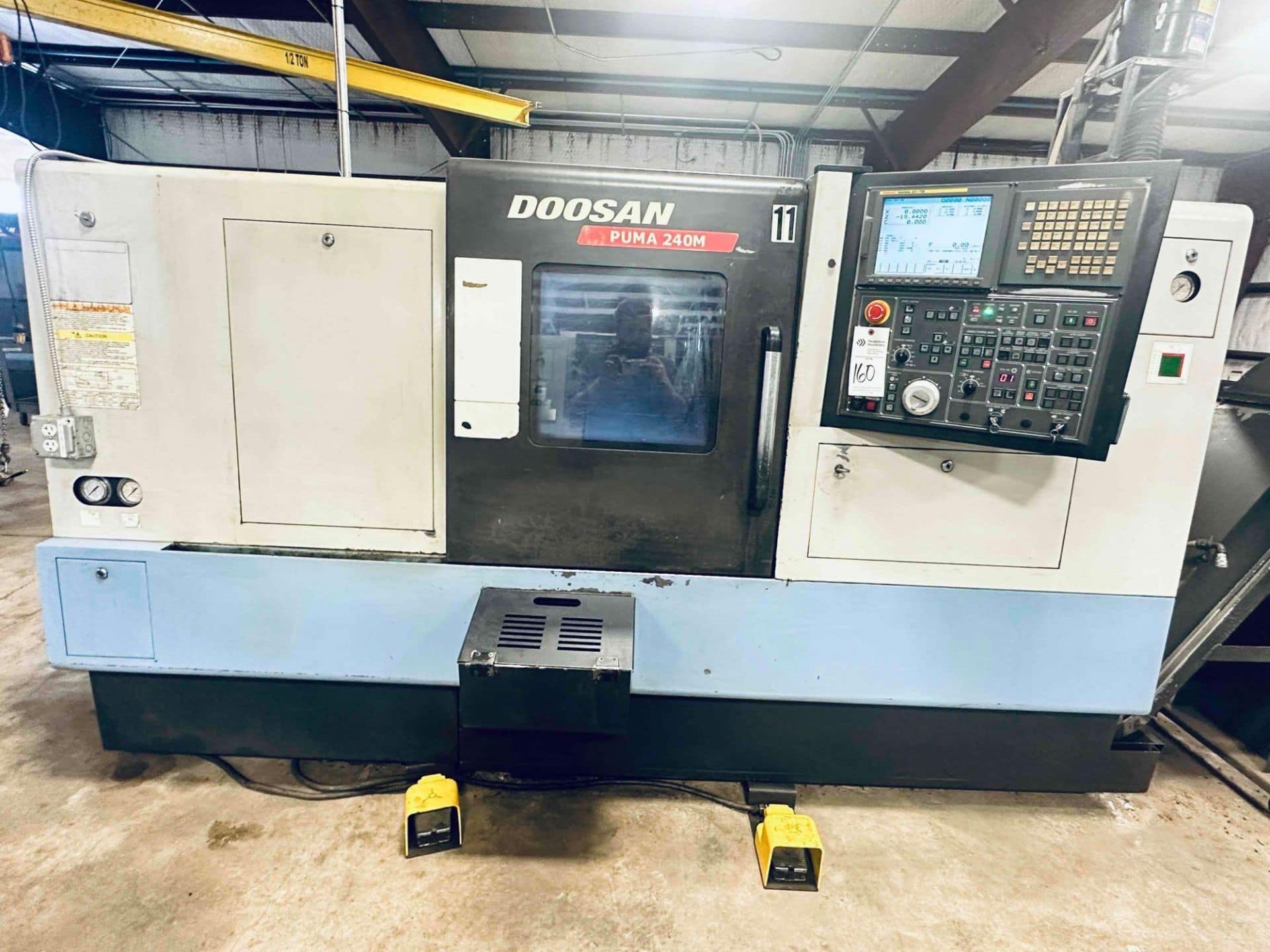 DOOSAN PUMA 240M TURNING CENTER WITH TURBO SYSTEMS CHIP CONVEYOR