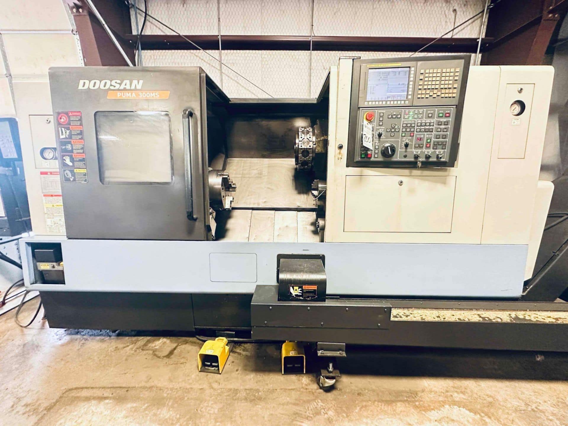 DOOSAN PUMA 300 MS TURNING CENTER WITH JORGENSEN CHIP CONVEYOR