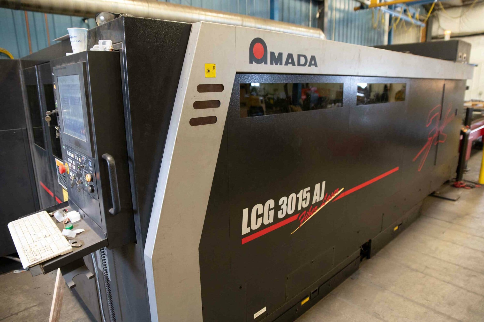 2000 watt Amada LCG 3015 AJ Fiber Laser