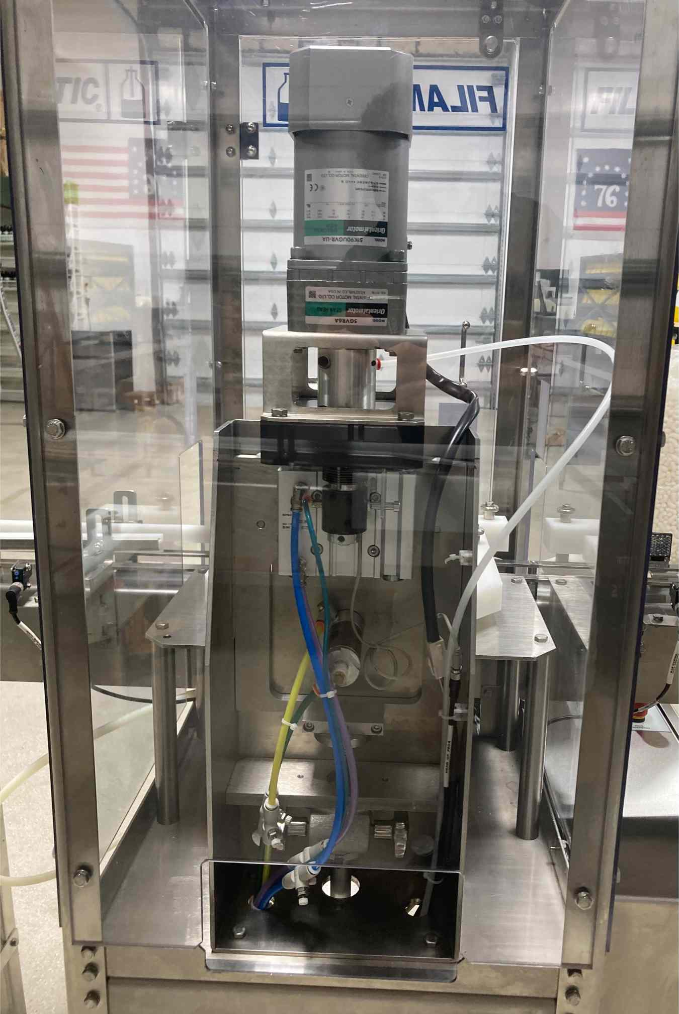 Filamatic Econofil Dual Head Filler and CT-100 Cap Tightener