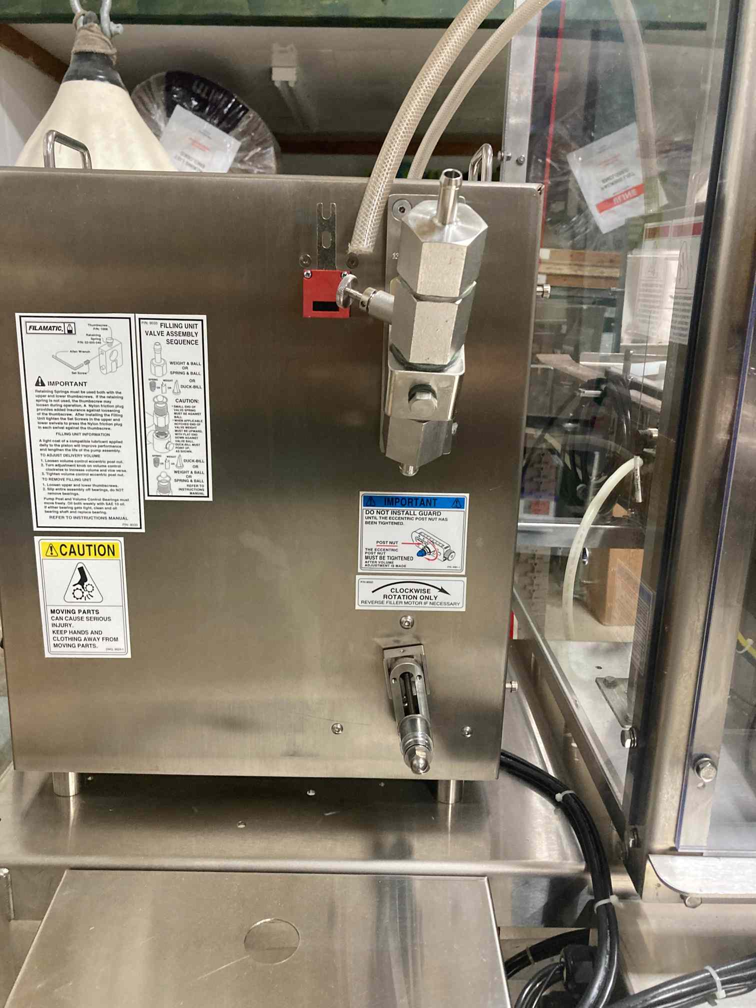 Filamatic Econofil Dual Head Filler and CT-100 Cap Tightener