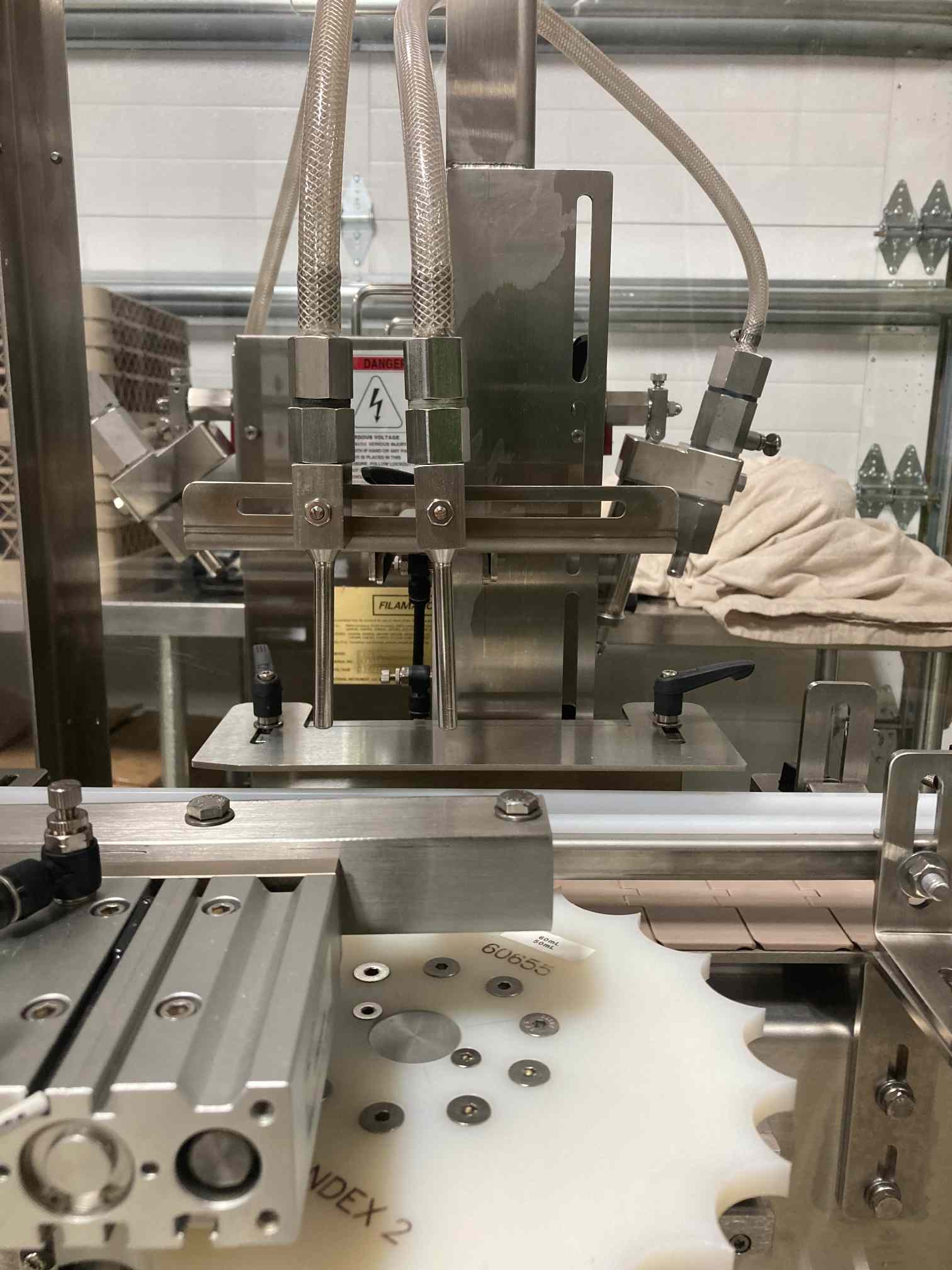 Filamatic Econofil Dual Head Filler and CT-100 Cap Tightener