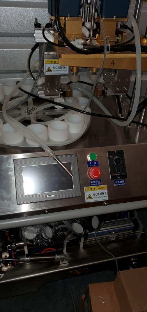 YQ Machinery YQTF-100 Table Top Cosmetic Filler and Cap Tightener Customized for 4 oz and 8 oz Boston Rounds