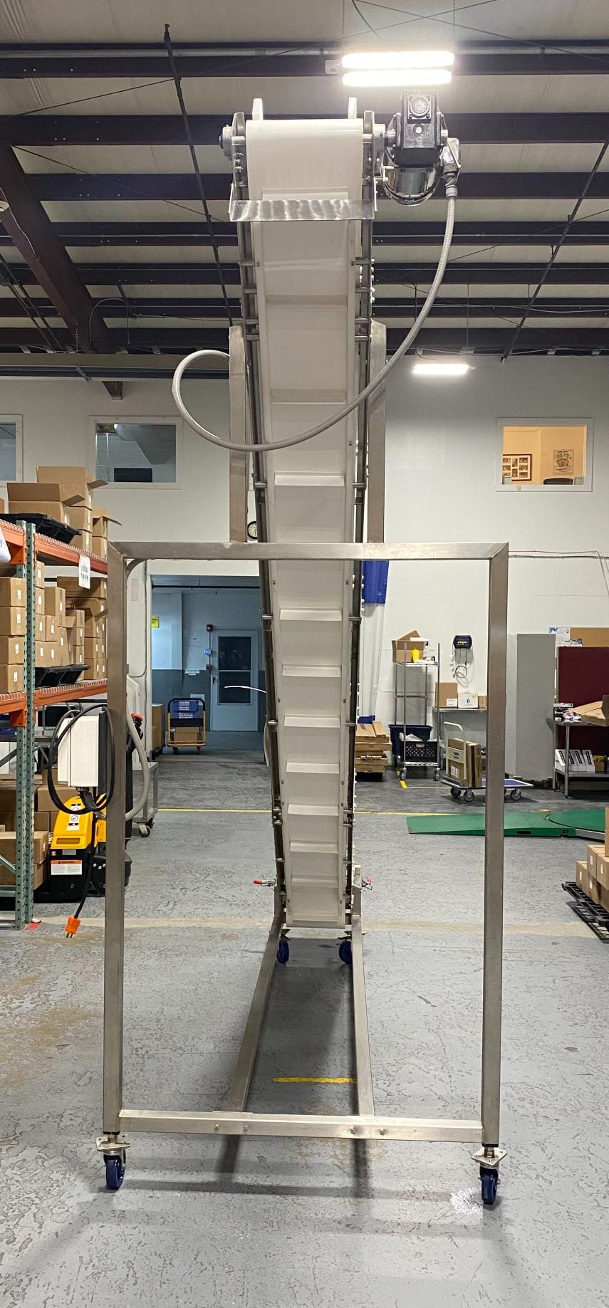 Fully WashDown Nae Pack Cleated Incline Conveyor with 10 Foot Discharge Height