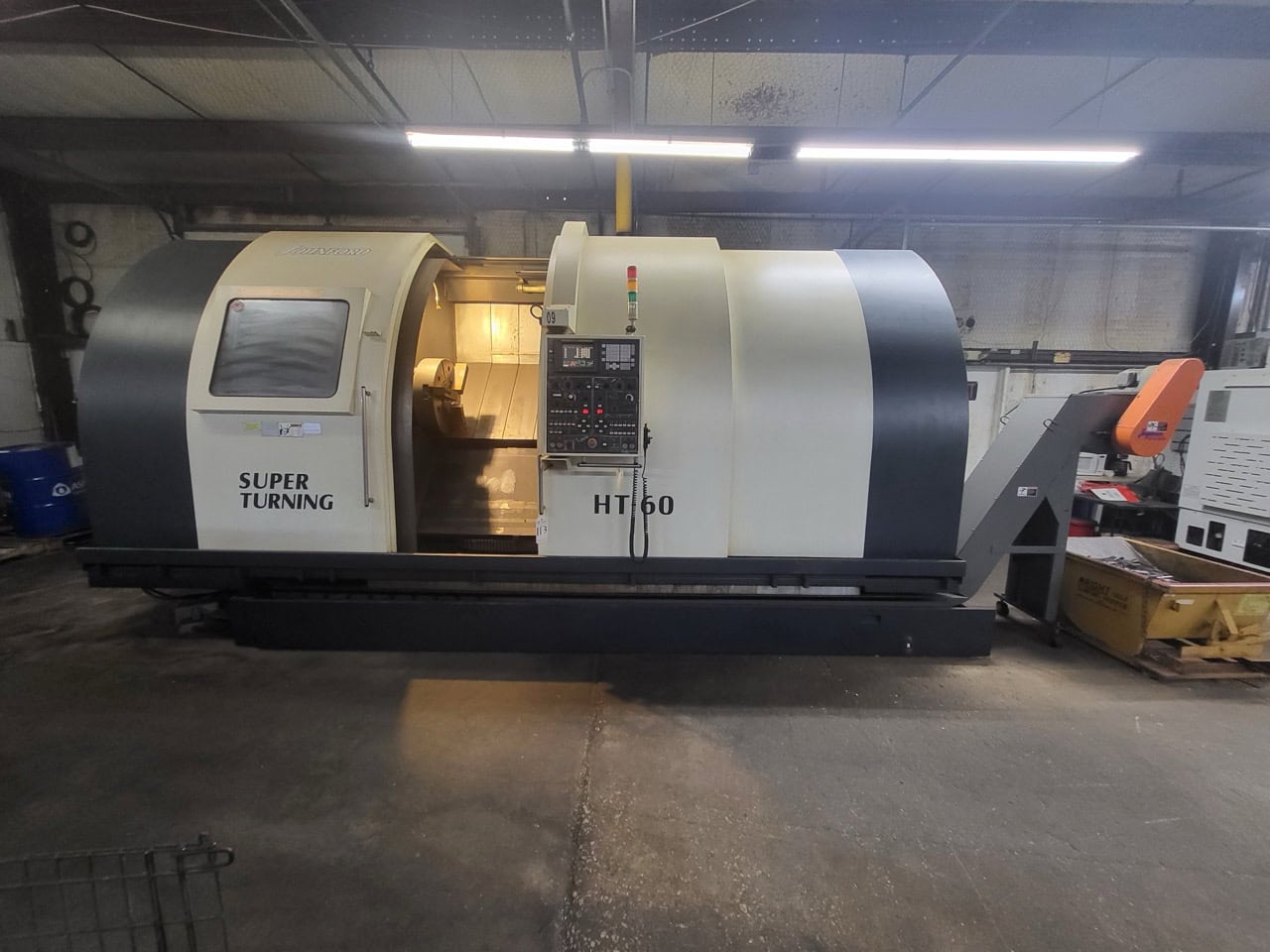 JOHNFORD HT-60-2D CNC Lathe, 2004 - Twin Turret, Chip Conveyor, Programable Tailstock, 24" Chuck