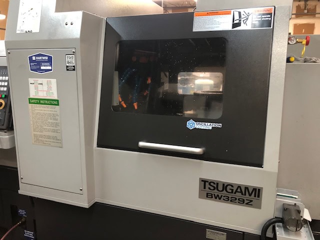 Tsugami BW329Z Swiss CNC Lathe, 2023 - Chip Conveyor, Patriot Barfeeder, Fire Suppression System