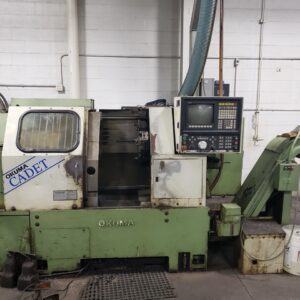 Okuma Cadet CNC Lathe, 1992 - Tailstock, Chip Conveyor, Extras