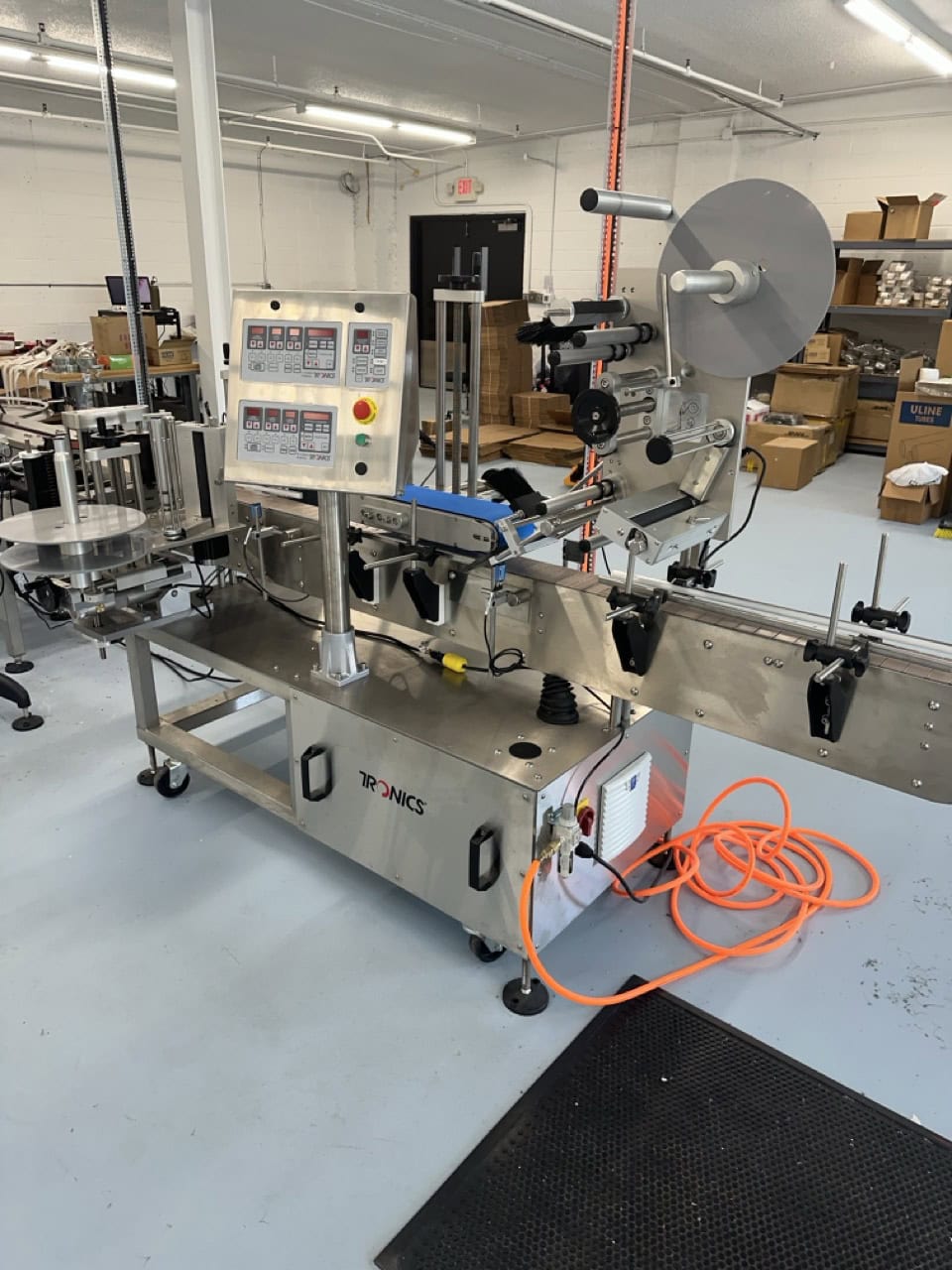 Tronics S30TP Wraparound and Top Labeler, 2018 - Includes Accumulation Table, Coder, Gap Transfer Conveyor