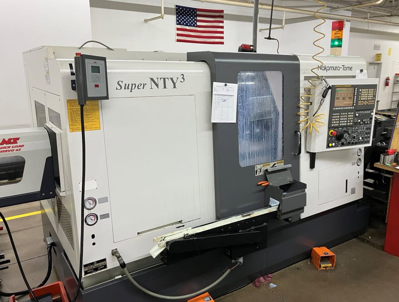 Nakamura Super NTY3 Twin-Spindle CNC Lathe, 2006 - 3 Turret, Y-Axis, Live Tool, Bar Feeder, Fanuc