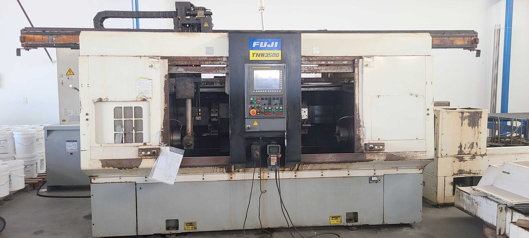 FUJI TNW-35TR 6-AXIS TWIN SPINDLE LIVE TOOL LATHE W/ GANTRY LOADER, 2007- Twin Turrets, 8" Chucks x2