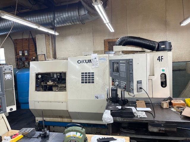 Okuma LU-15 CNC Lathe, 2000 - Live Tooling, Dual Turrets, Tooling Included, Chip Conveyor