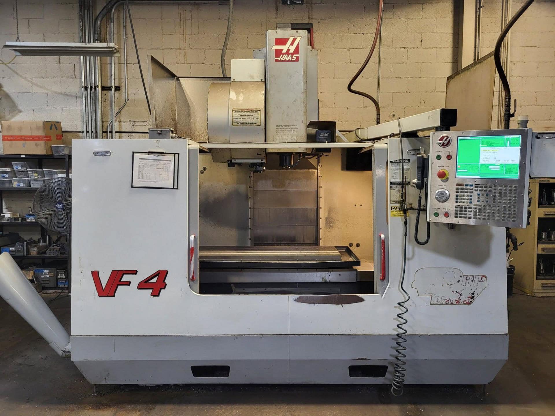Haas VF-4 CNC VMC, 2001 - 4th Axis Drive & Prewire, Chip Auger, Side-Mount Tool Changer