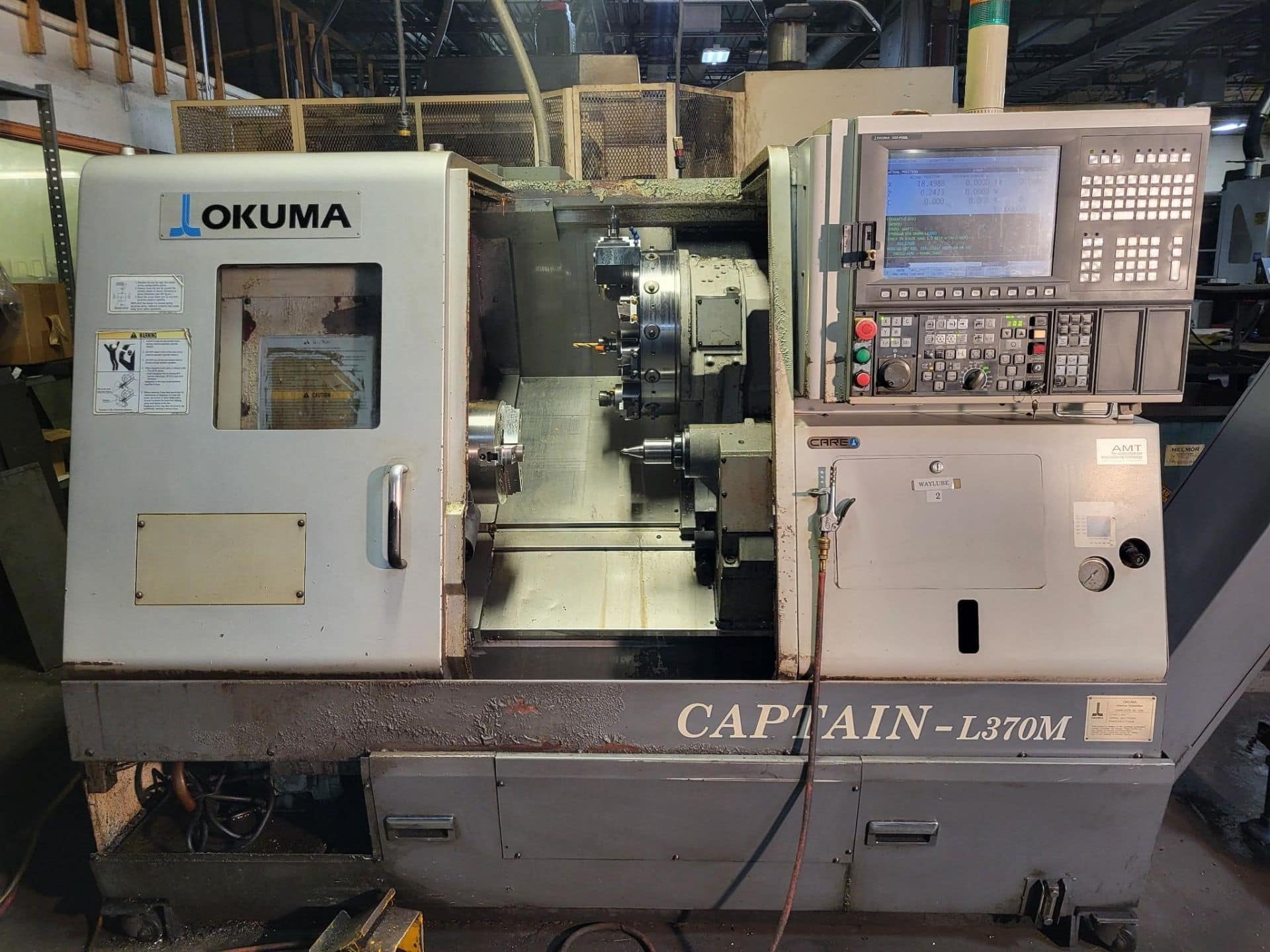 Okuma Captain L-370M CNC Lathe, 2006 - Tailstock, Live Tooling, Chip Conveyor