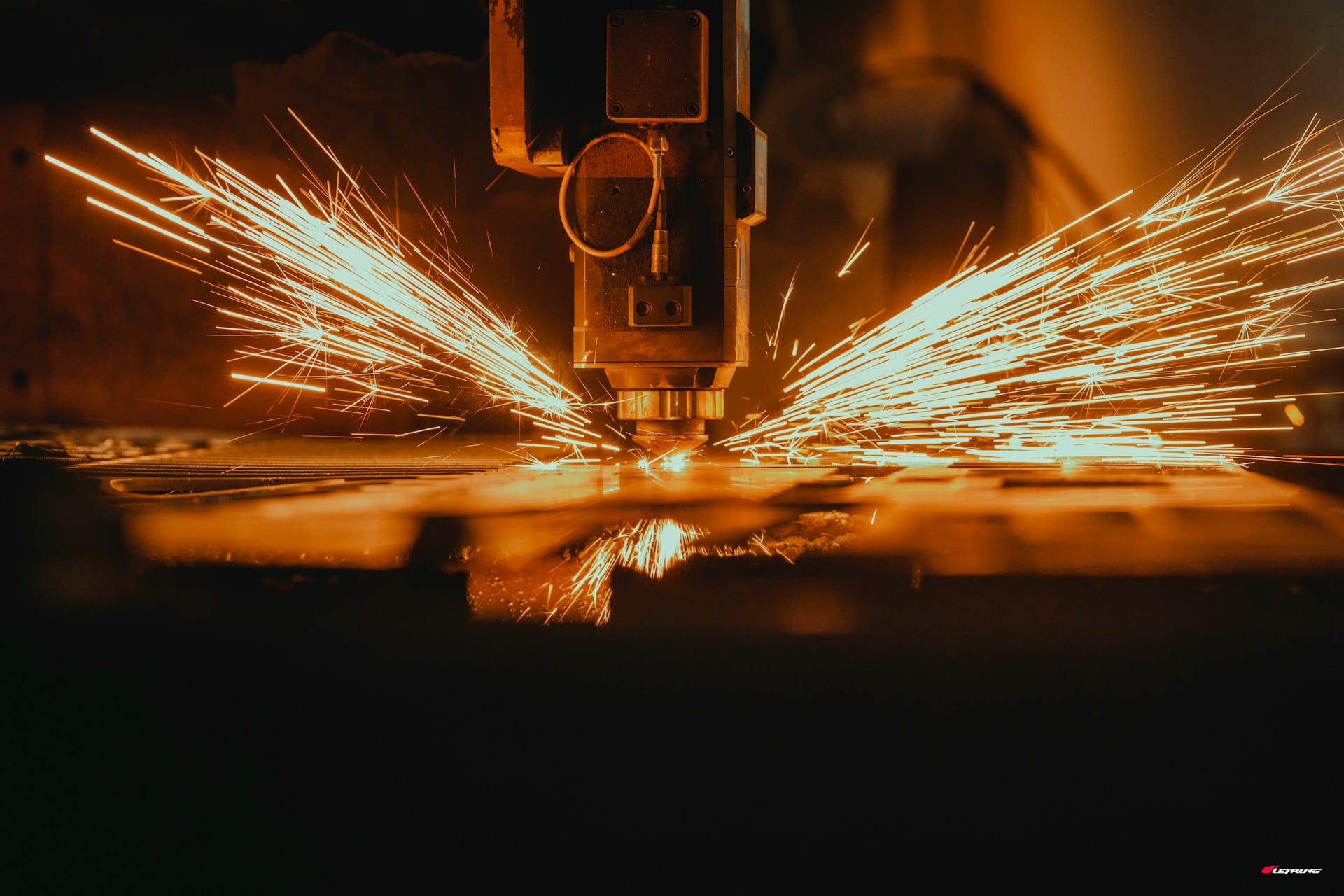 Metal being cut by a CNC machine