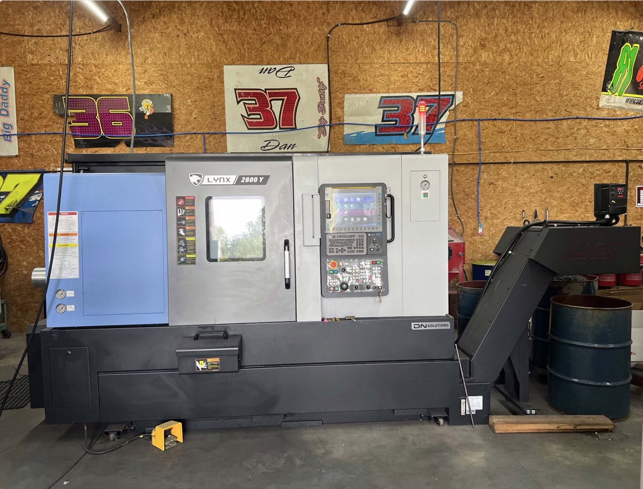 DN Solutions Lynx 2600Y CNC Turning Center, 2023 - Low Cut Hours, Chip Conveyor, Tailstock, Parts Catcher