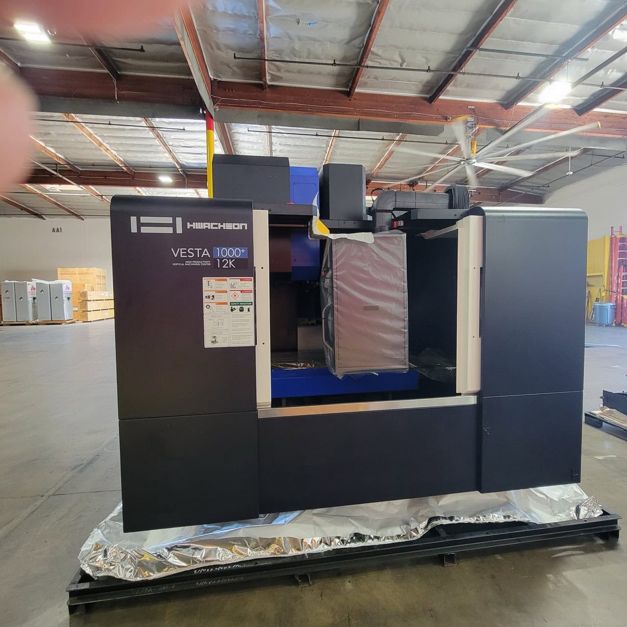 Hwacheon Vesta 1000+ VMC, 2022 - Chip Conveyor, Daikin Oil Cooling Unit, GSA, Air Dryer, Never Been Used