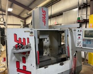 Haas VF0E VMC, 1995 - Chip Auger, 20 ATC