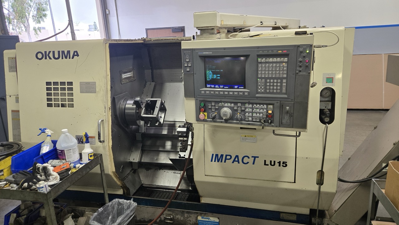 Okuma Impact LU15 CNC Lathe, 1995 - Dual Turret, Tailstock, Chip Conveyor