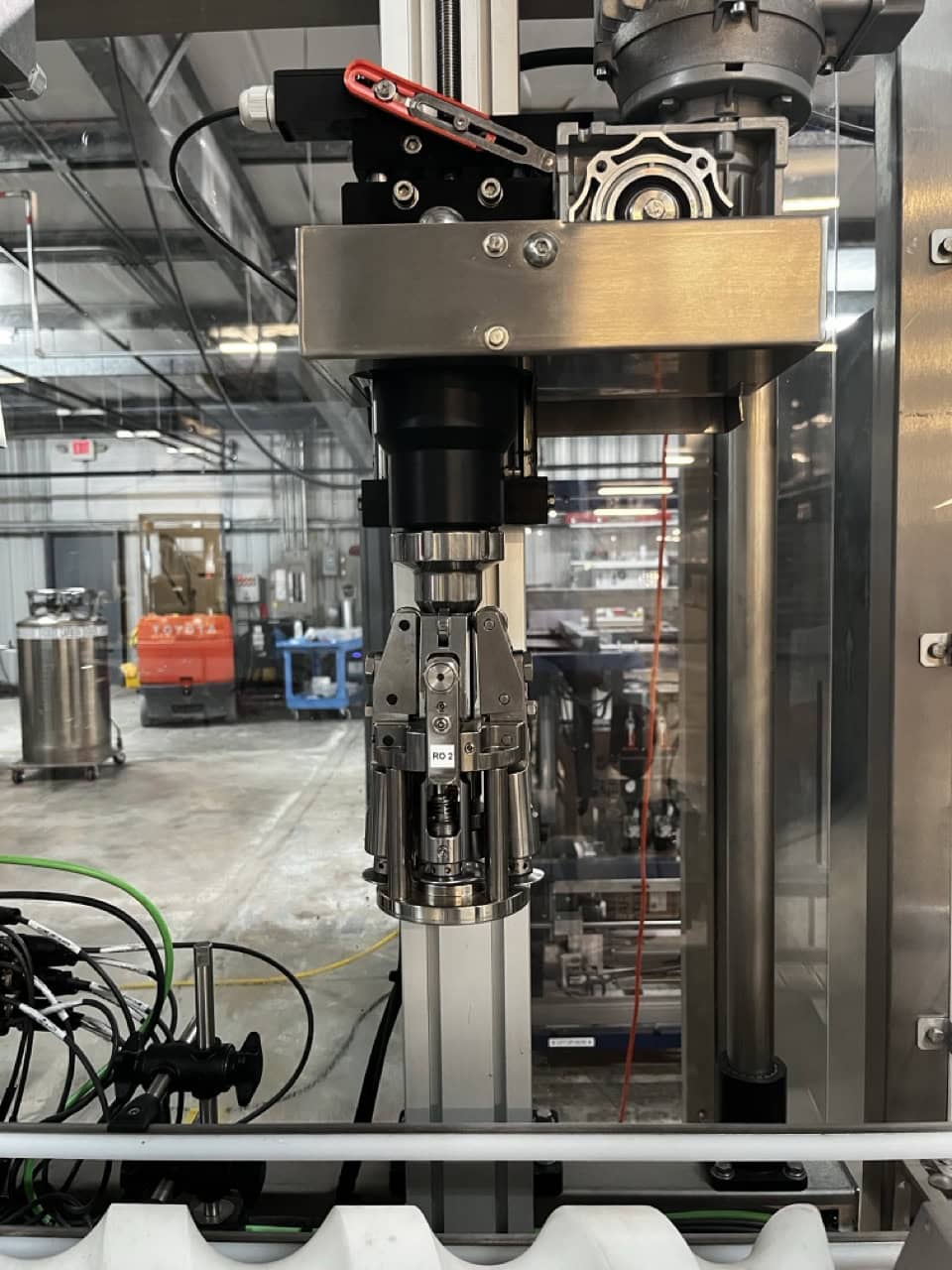 Norland International Complete line with (2) GlassPak66 Monoblock Systems (16oz and 25 Oz) for Glass or Aluminum with Fluid Solutions 3 Head ROPP Capper, 2020: - Image 12