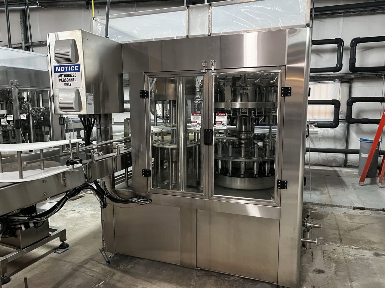 Norland International Complete line with (2) GlassPak66 Monoblock Systems (16oz and 25 Oz) for Glass or Aluminum with Fluid Solutions 3 Head ROPP Capper, 2020: - Image 5