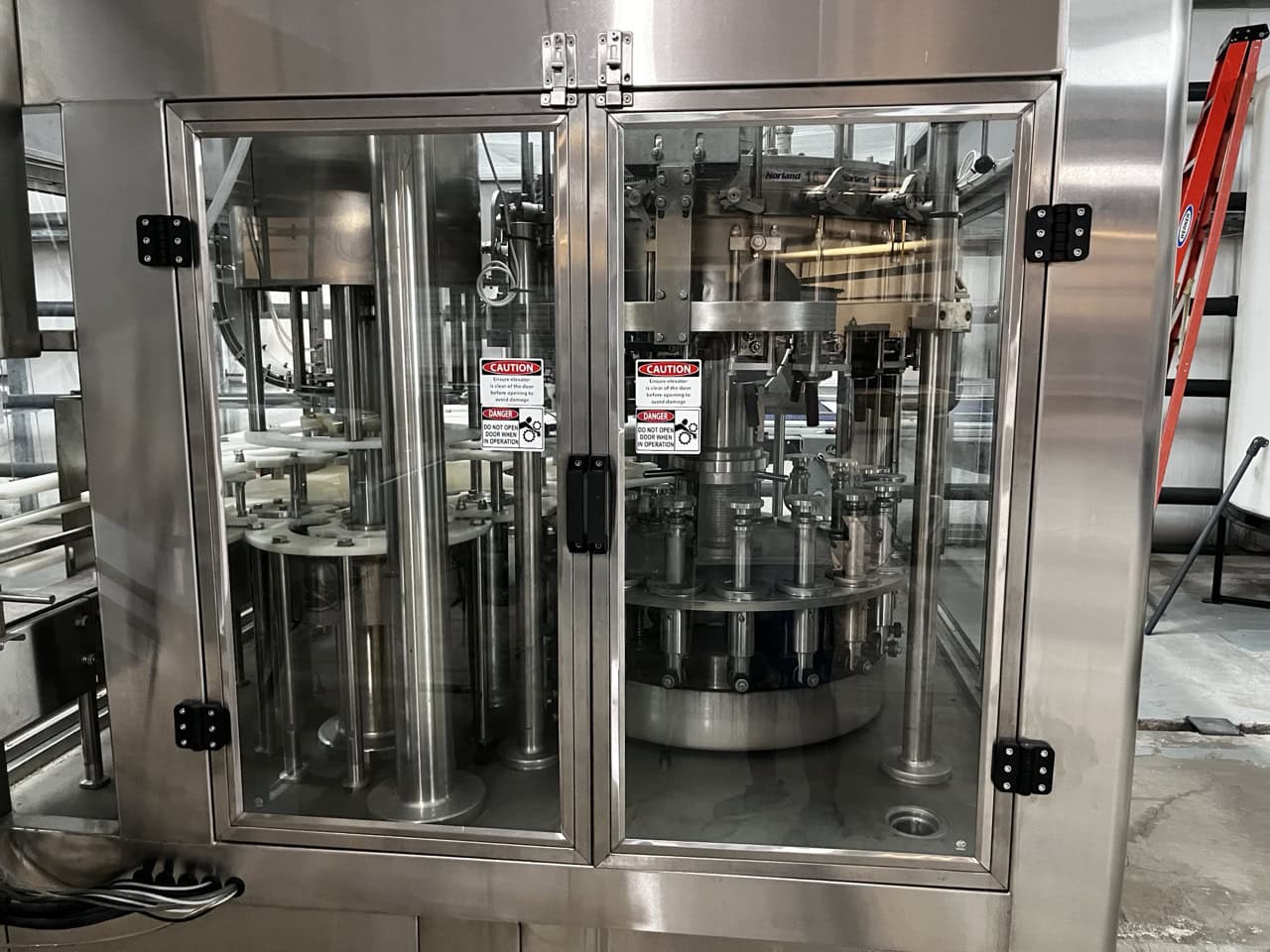 Norland International Complete line with (2) GlassPak66 Monoblock Systems (16oz and 25 Oz) for Glass or Aluminum with Fluid Solutions 3 Head ROPP Capper, 2020: - Image 7