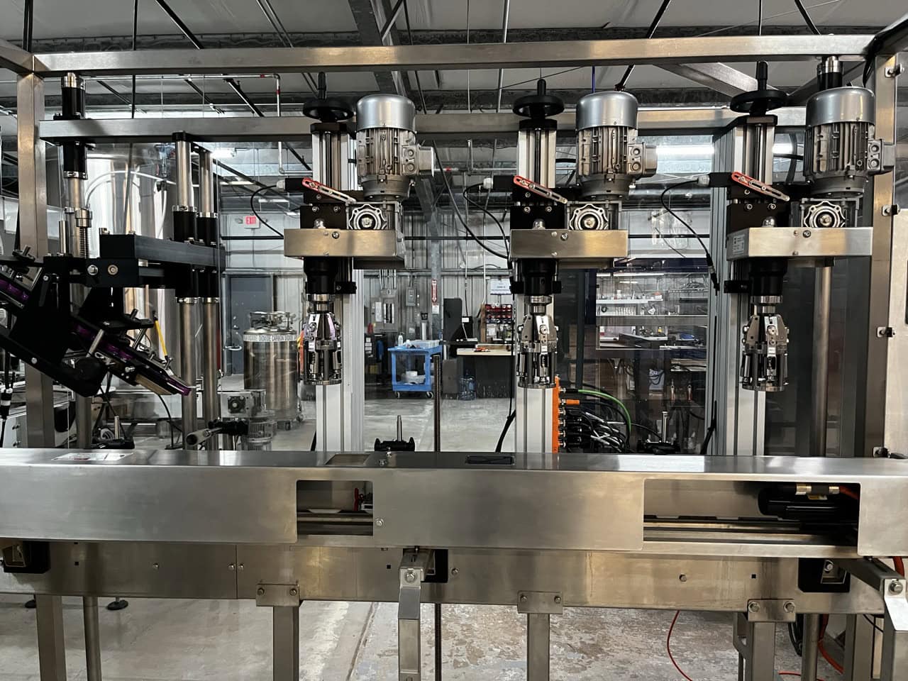 Norland International Complete line with (2) GlassPak66 Monoblock Systems (16oz and 25 Oz) for Glass or Aluminum with Fluid Solutions 3 Head ROPP Capper, 2020: - Image 26