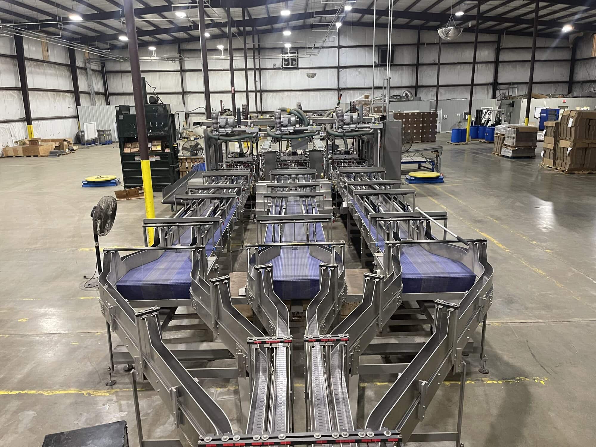 Complete End-of-Line Packaging System by Douglas/IPM for Bundling & Palletizing Beverage Variety Packs - Image 8