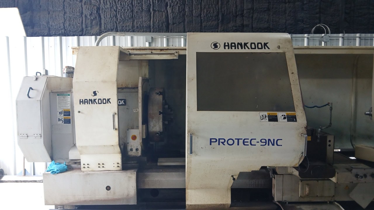 37.4" x 156" Hankook Protec 9NC 10" Spindle Bore, Dual Chucks, 2006 - Chip Conveyor, 8 Station Turret