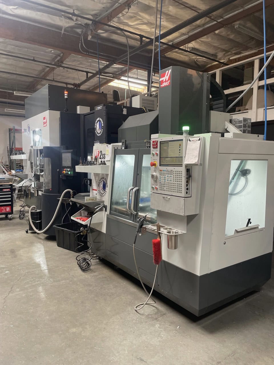 Haas VF-2SS VMC, 2023 - TSC, WIPS, Multi Auger, Auto Window, High Pressure Coolant, HSM, Programmable Coolant