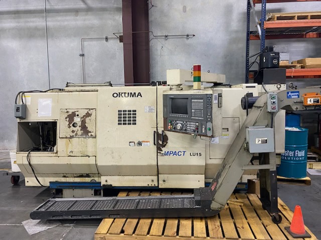 Okuma LU15 CNC Lathe, 2002 - Tailstock, Chip Conveyor