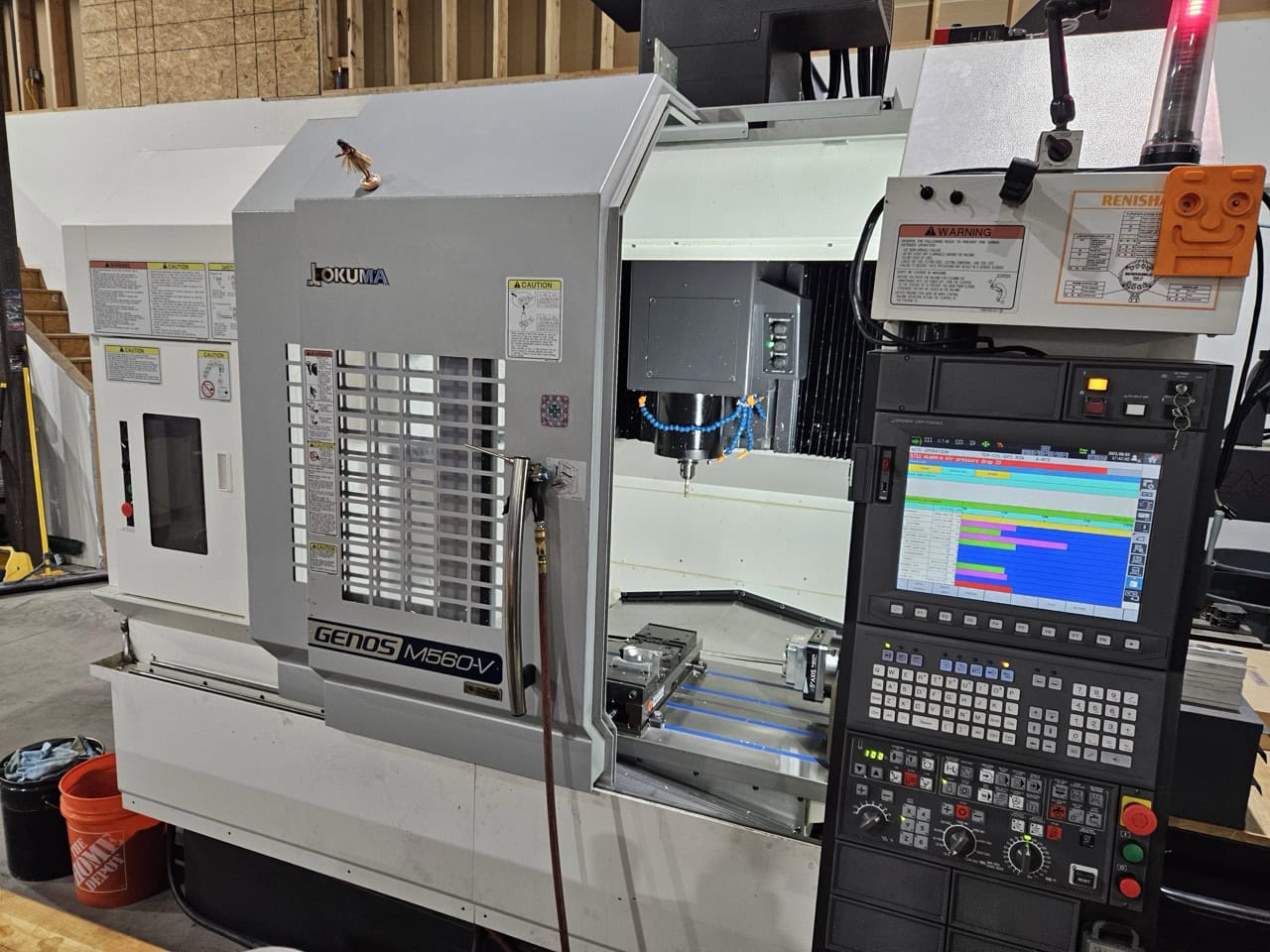 Okuma Genos M560-V CNC VMC, 2022 - Low Hours, TSC, Probes, 4th Axis, Chip Conveyor, 15K Spindle