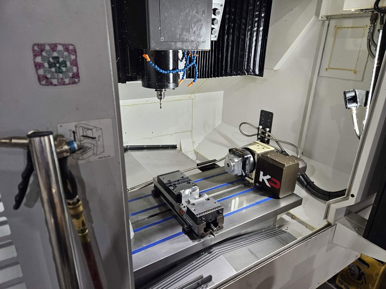 Okuma Genos M560-V CNC VMC, 2022 - Low Hours, TSC, Probes, 4th Axis, Chip Conveyor, 15K Spindle - Image 2