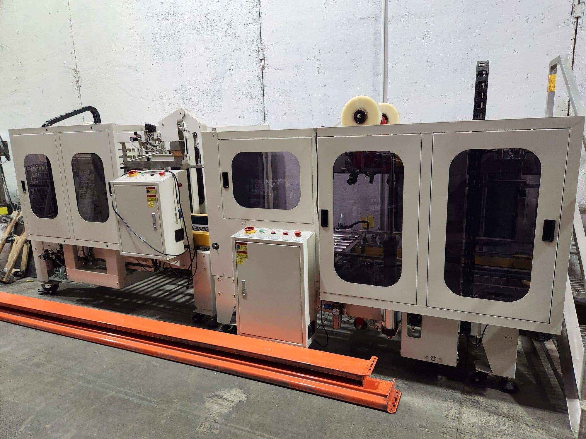 High-Speed Modular Fulfillment Line – Fully Integrated Turnkey Packaging & Automation System with Robotic and Labeling Sync