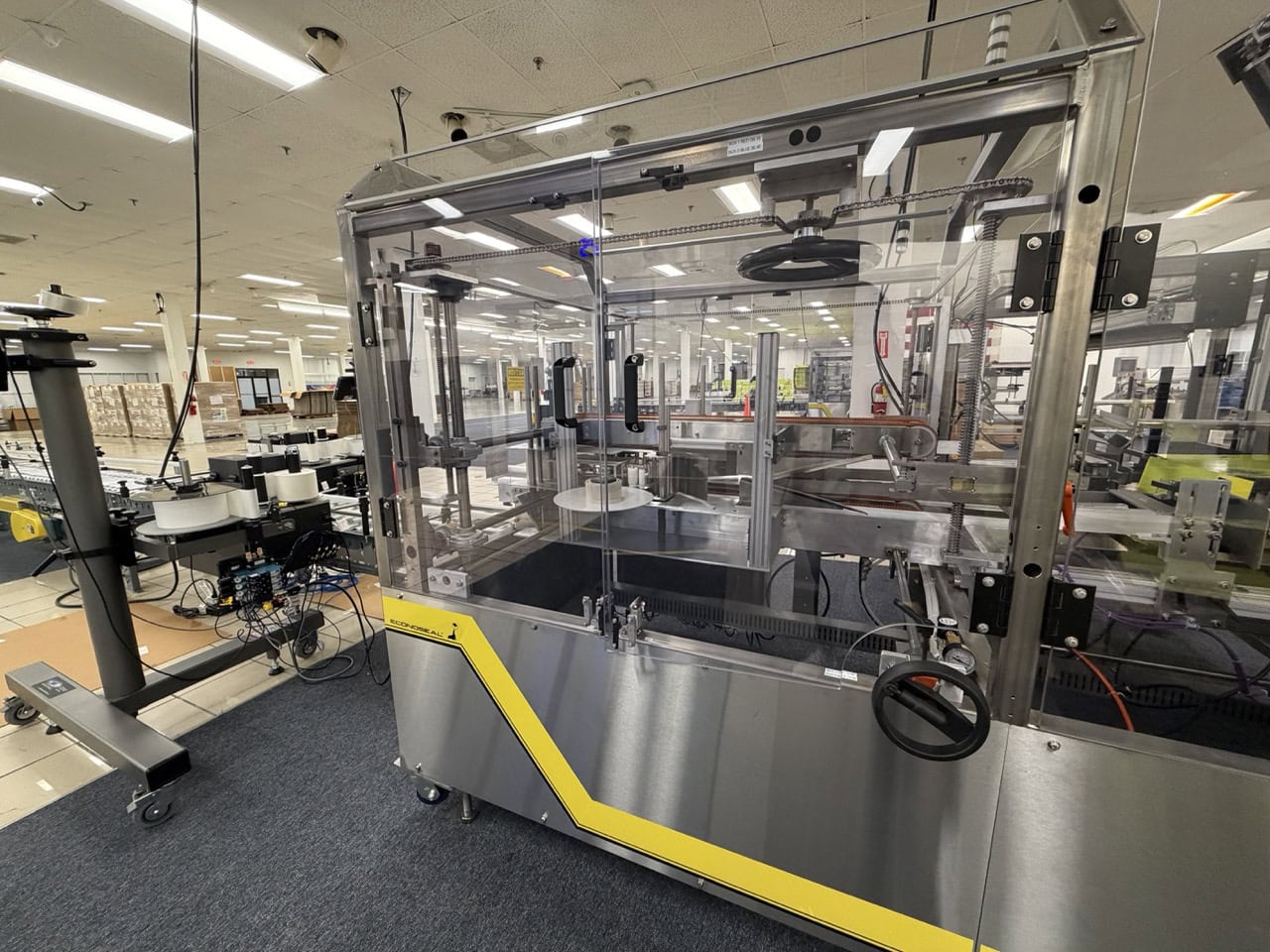 Econocorp Econocase Case Packer 10829, 2023 - With Automatic Product Collator/Loader and Tape Closure - Image 2