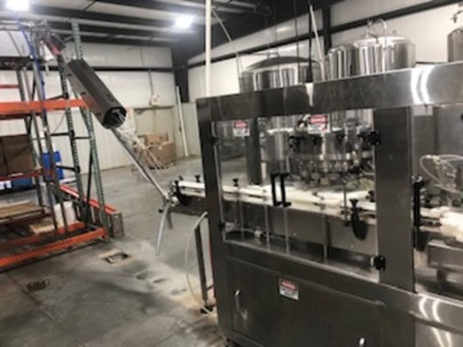 Complete Beverage Canning line with Ska Fab Depalletizer, Palmer Canner 12-1, 2015 - Equipped with Axon Sleever and Shrink Tunnel, Eastey Sleeve Wrapper and Shrink Tunnel, Dakota Water RO System, 3,000 Gallon Poly Tank, Pro-Refrigeration Glycol Chilling Unit, 30 BBL Tank, 40 BBL Tank, 60 BBL Tank - Image 4