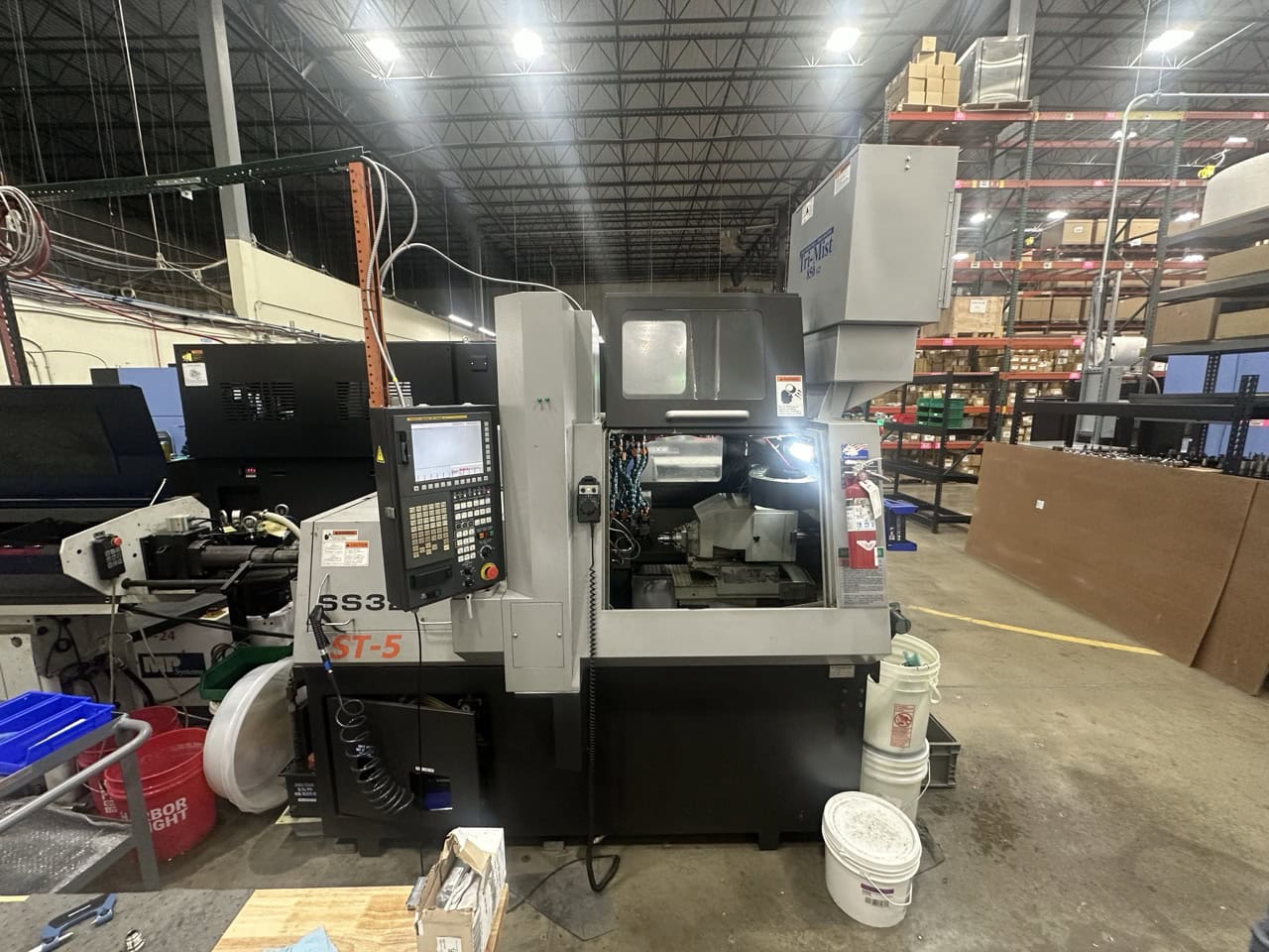 Tsugami SS32 32mm CNC Swiss Lathe, 2010- Fire Supression, Mist Collector, Bar Feeder