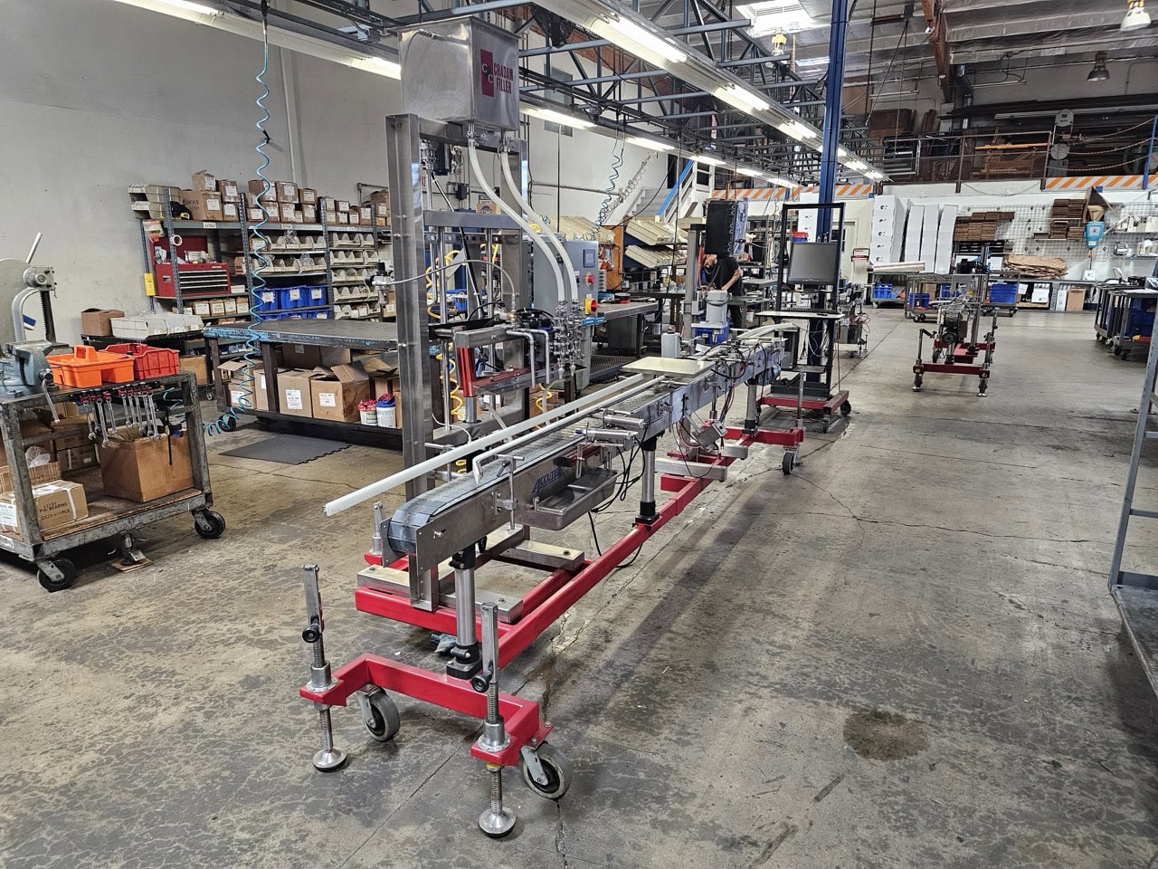 Accutek Bottling Line with Chadam Consultants 2 Head Gravity Filler, Accutek SA-1 Automatic Chuck Capper, Accutek APS106 Labelette Labeler, Everfilt Oil Filtration System, IBC Tanks - Image 2
