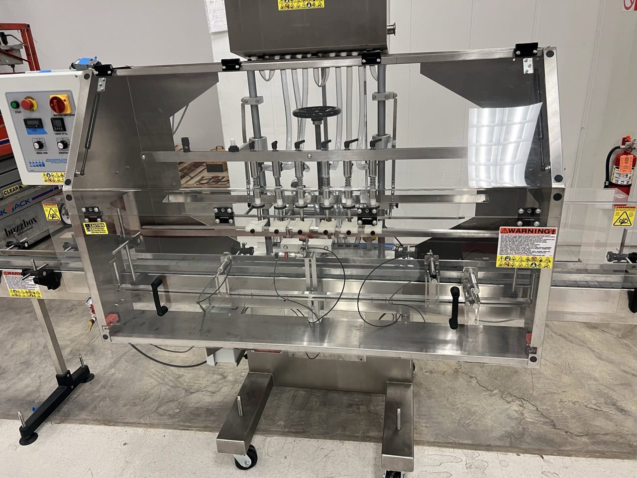 Kaps-All Complete Bottling & Corking Line – AC-65 Bottle Cleaner, FA-PG-E 12-Head Filler, BC-23 Carrier, Conveyors & Custom Feeder Corker - Image 2