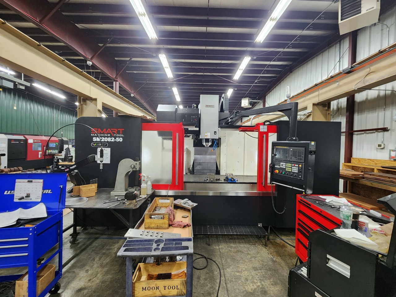 Smart SM2082-50 VMC, 2024 - 6K RPM Gear Driven Spindle, Box Ways, TSC, Chip Conveyor
