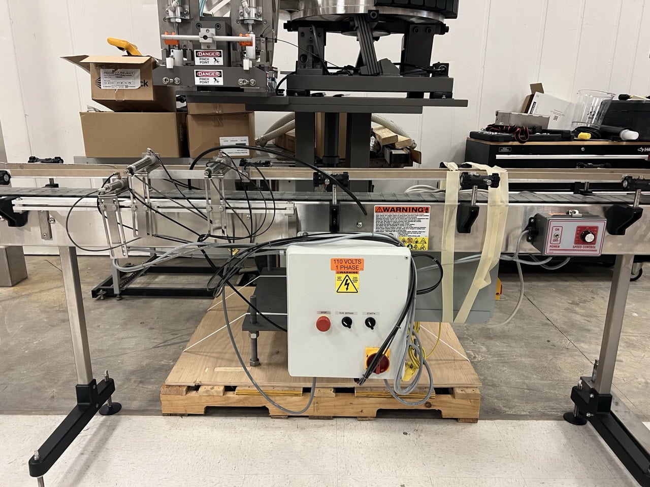 Kaps-All Complete Bottling & Corking Line – AC-65 Bottle Cleaner, FA-PG-E 12-Head Filler, BC-23 Carrier, Conveyors & Custom Feeder Corker - Image 3