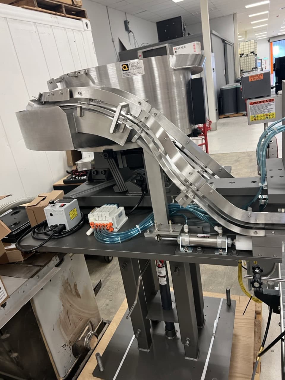 Kaps-All Complete Bottling & Corking Line – AC-65 Bottle Cleaner, FA-PG-E 12-Head Filler, BC-23 Carrier, Conveyors & Custom Feeder Corker - Image 5