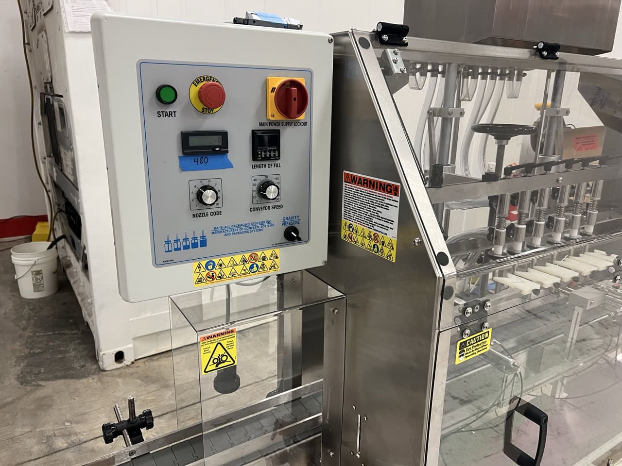 Kaps-All Complete Bottling & Corking Line – AC-65 Bottle Cleaner, FA-PG-E 12-Head Filler, BC-23 Carrier, Conveyors & Custom Feeder Corker - Image 9