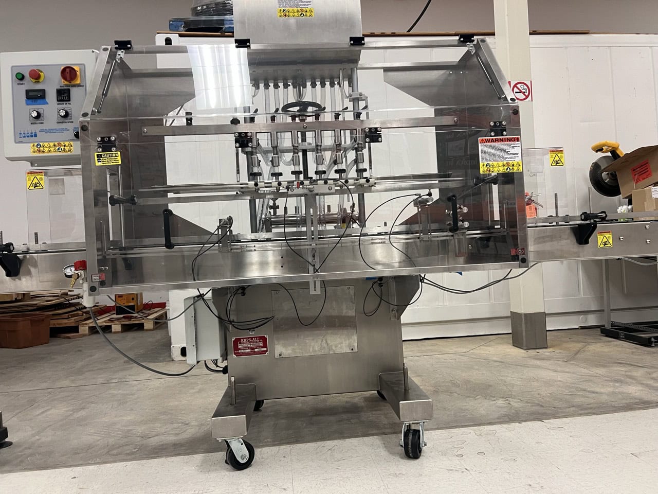 Kaps-All Complete Bottling & Corking Line – AC-65 Bottle Cleaner, FA-PG-E 12-Head Filler, BC-23 Carrier, Conveyors & Custom Feeder Corker - Image 10